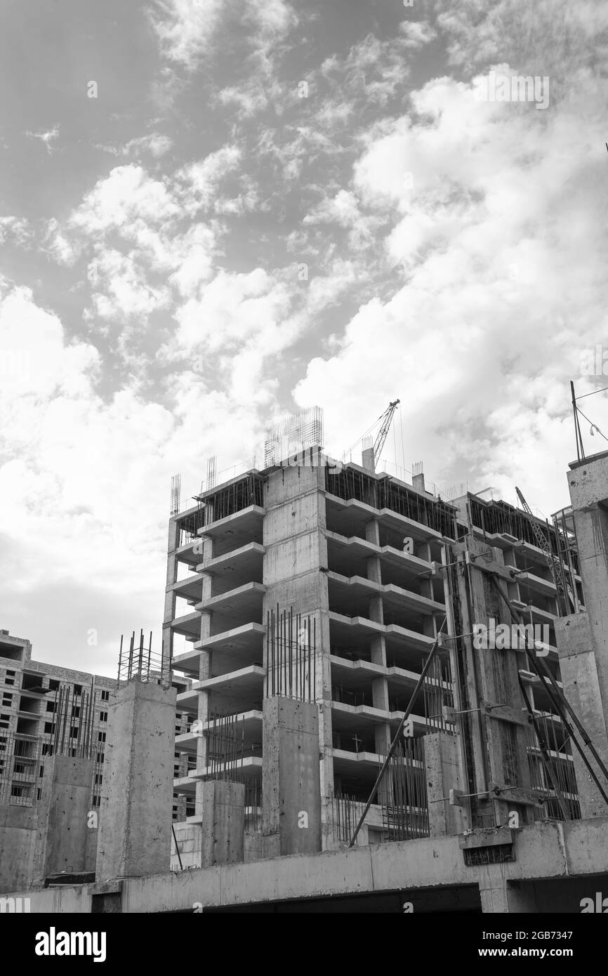 Black and white photo of a multi-storey residential building under ...