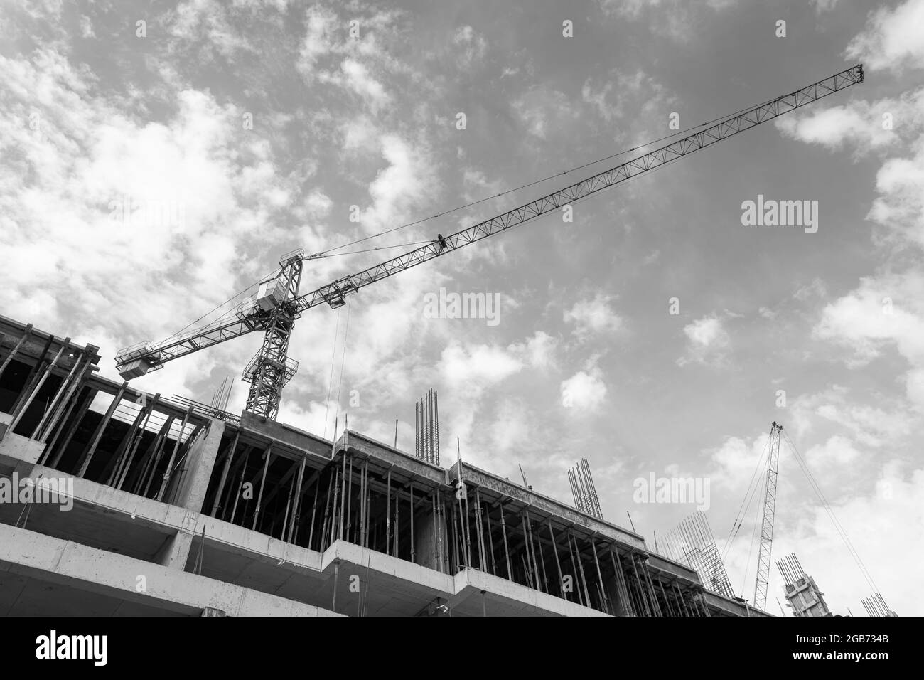 Black and white photo of a multi-storey residential building under ...