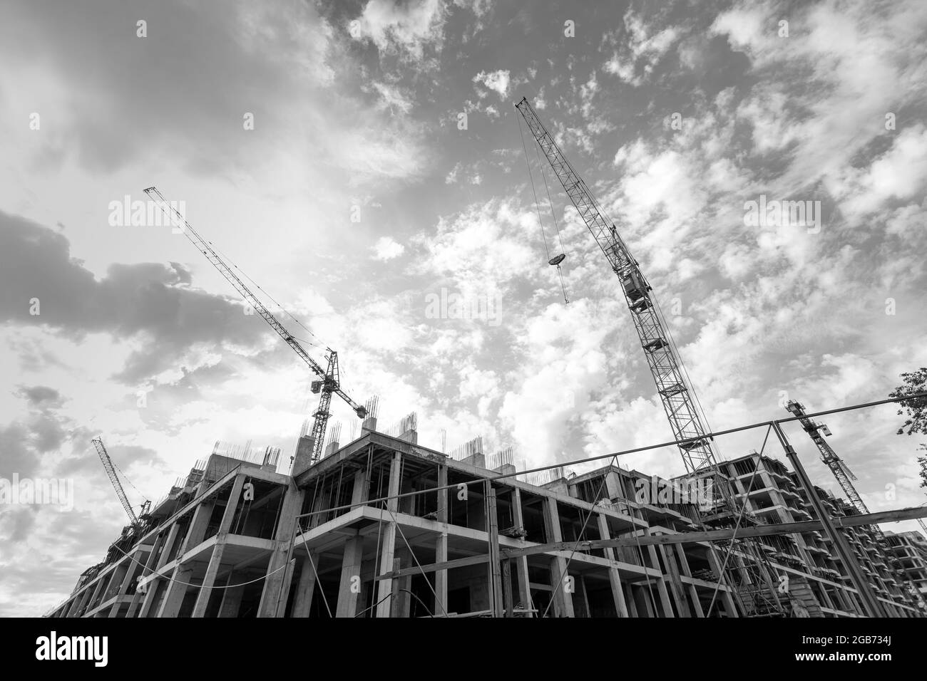 Black and white photo of a multi-storey residential building under ...