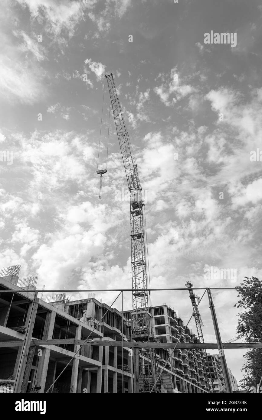 Black and white photo of a multi-storey residential building under ...