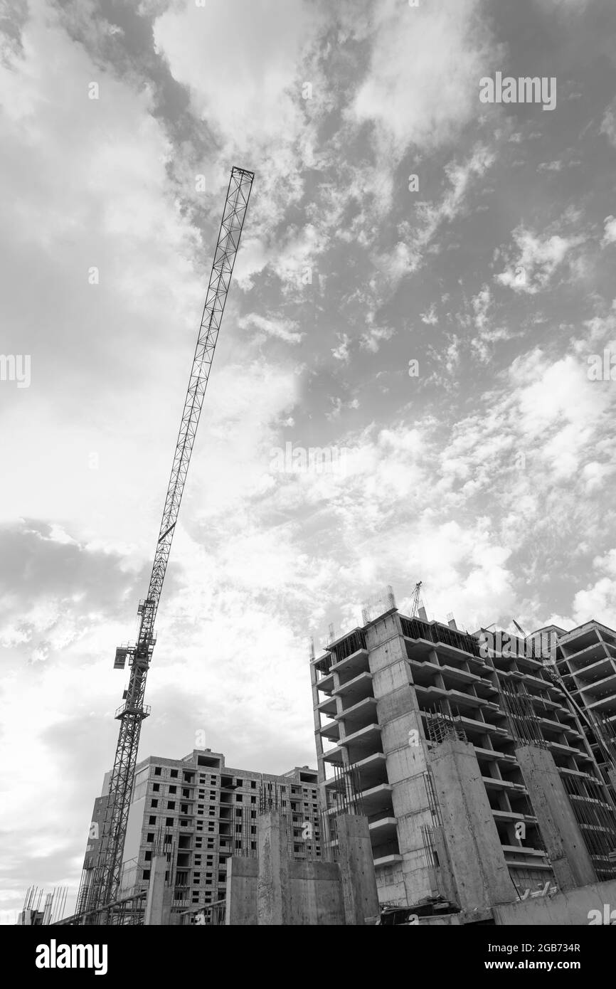 Black and white photo of a multi-storey residential building under ...