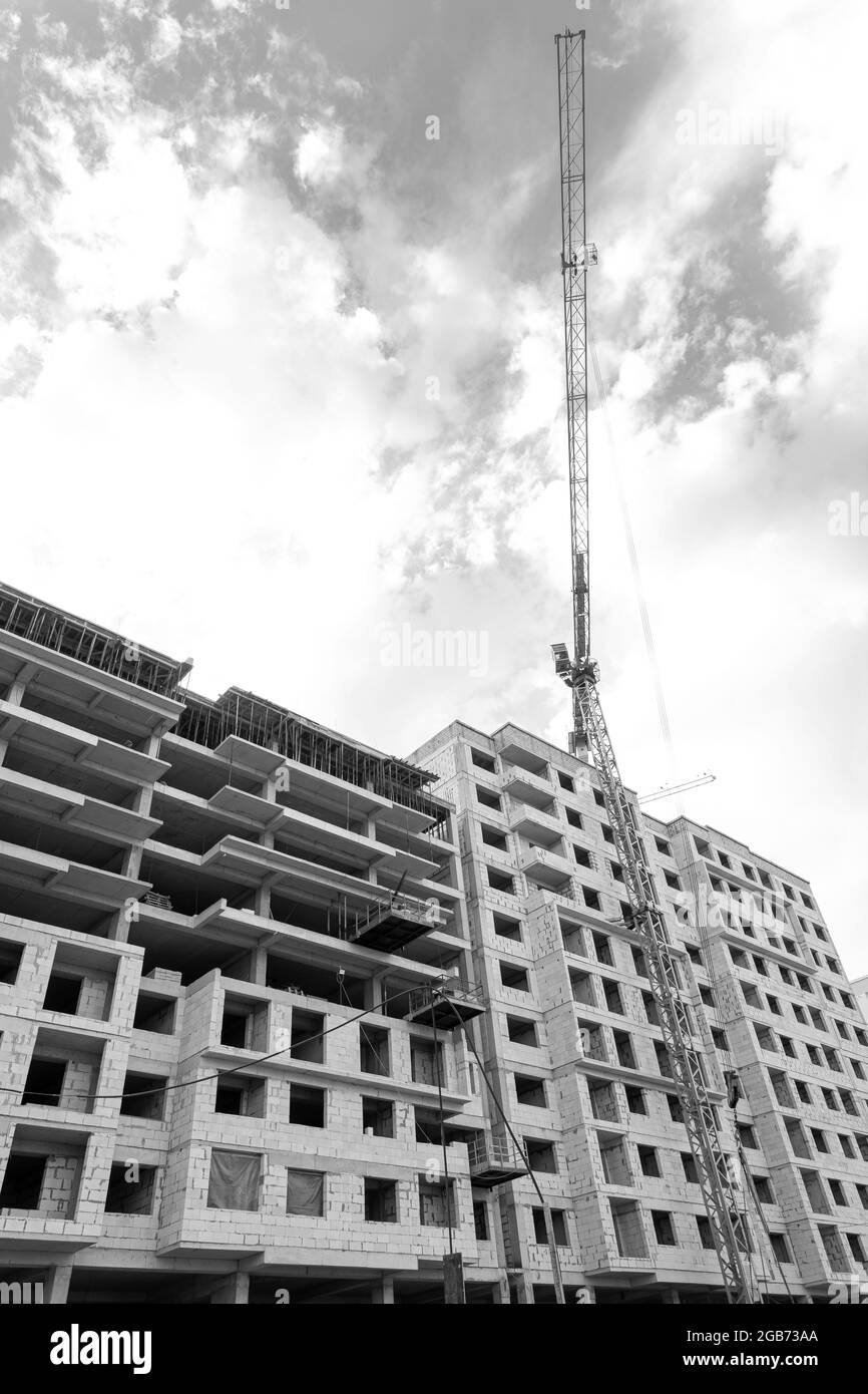 Black and white photo of a multi-storey residential building under ...