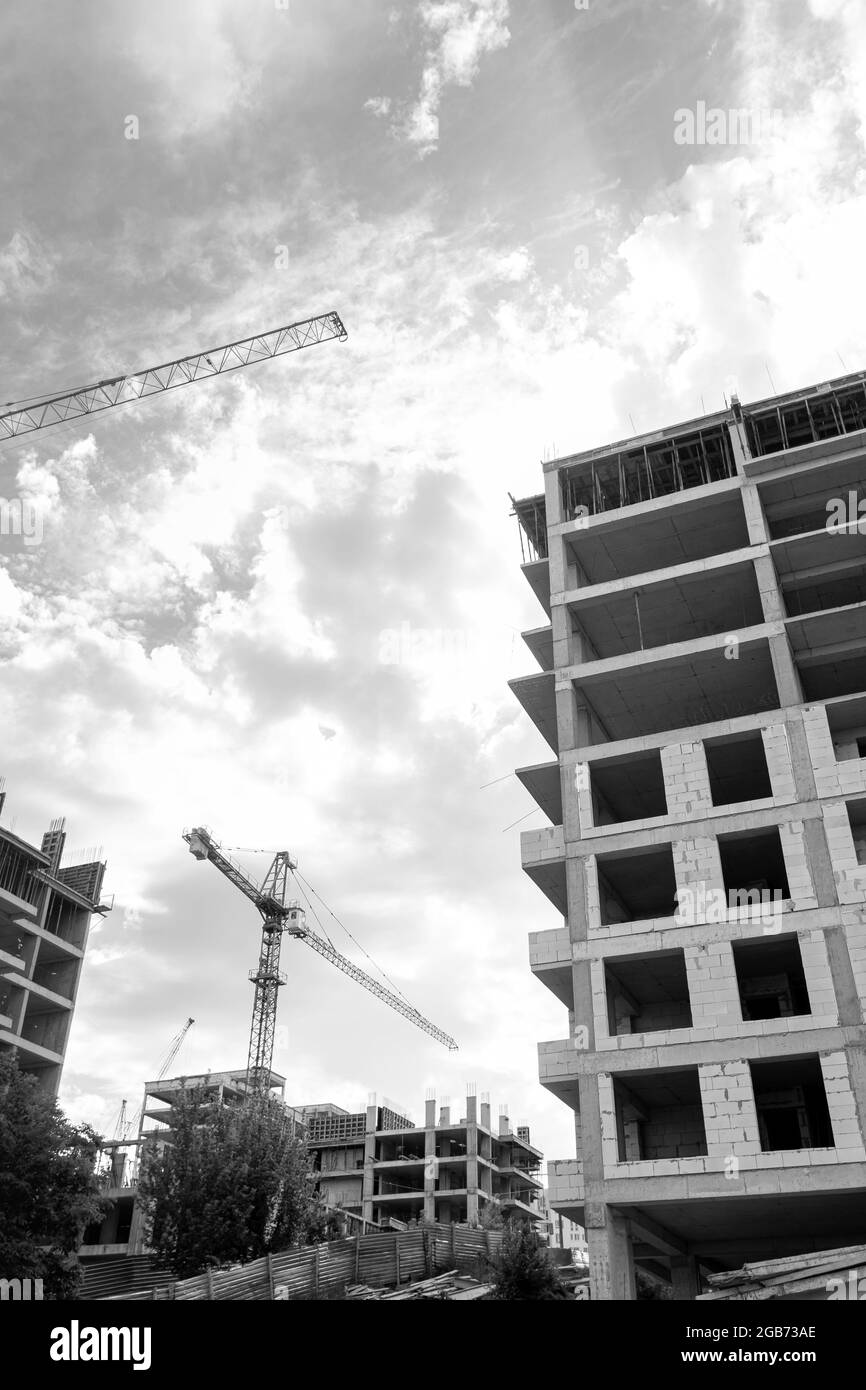 Black and white photo of a multi-storey residential building under ...