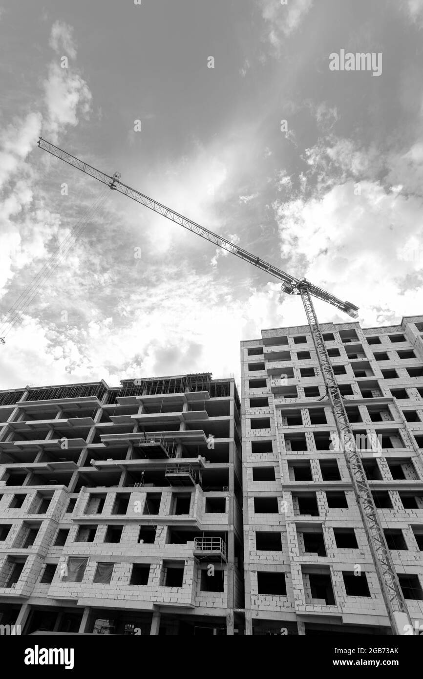 Black and white photo of a multi-storey residential building under ...