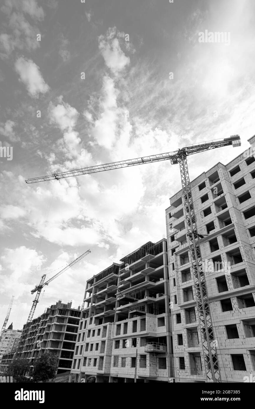 Black and white photo of a multi-storey residential building under ...