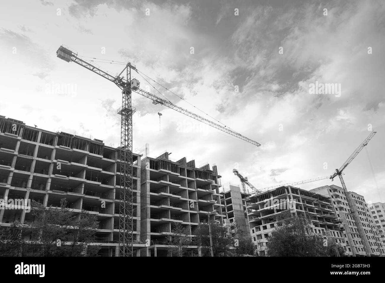 Black and white photo of a multi-storey residential building under ...