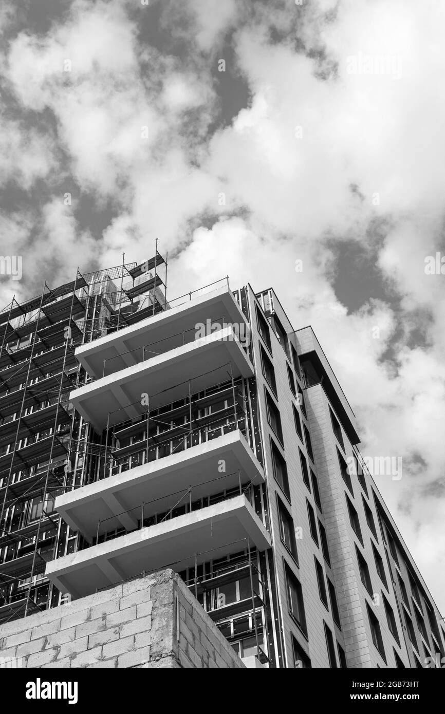 Black and white photo of a multi-storey residential building under ...