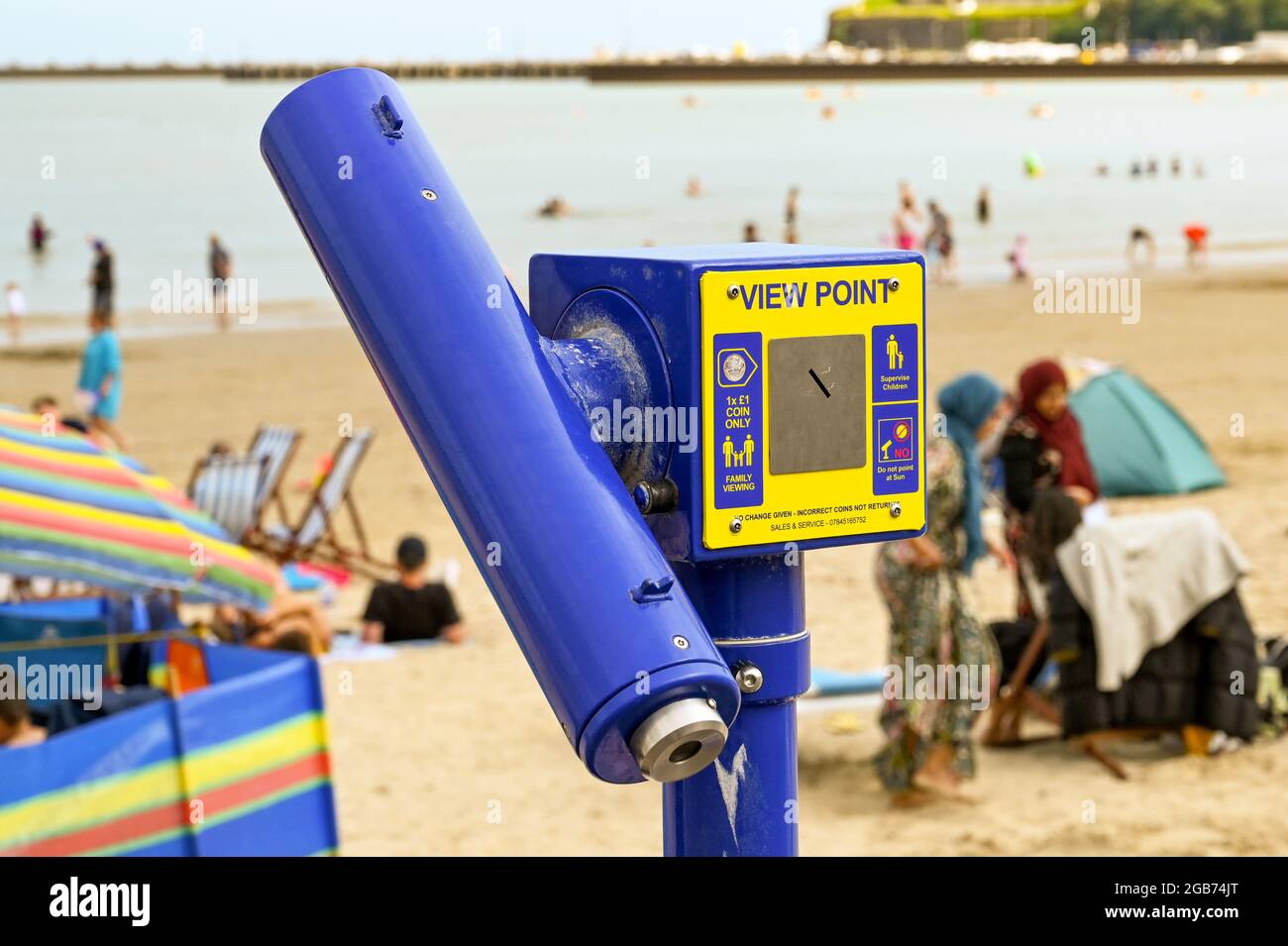Weymouth, England - July 2021: Coin operated telescope on the promenade in Weymouth Stock Photo