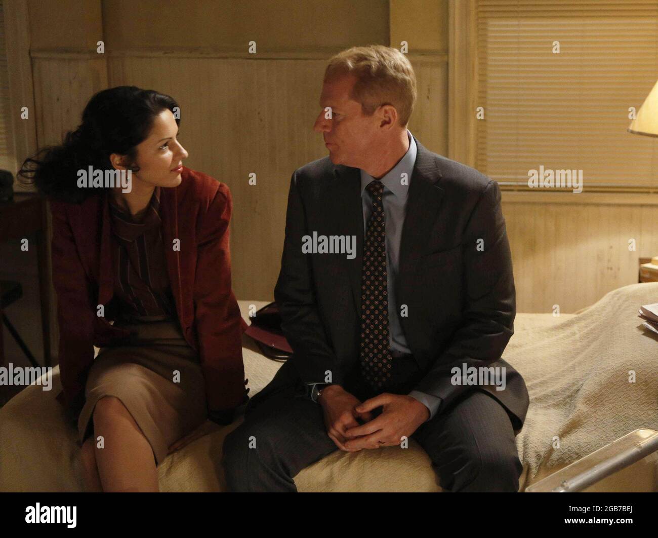 Los Angeles. CA. USA. Noah Emmerich and Annet Mahendru  in the ©FX new TV series: The Americans (2013). The story centers on Russian deep-cover spies operating in the United States in the 1980s.  Ref:LMK106-44290-280513 Supplied by LMKMEDIA. Editorial Only. Landmark Media is not the copyright owner of these Film or TV stills but provides a service only for recognised Media outlets. pictures@lmkmedia.com Stock Photo