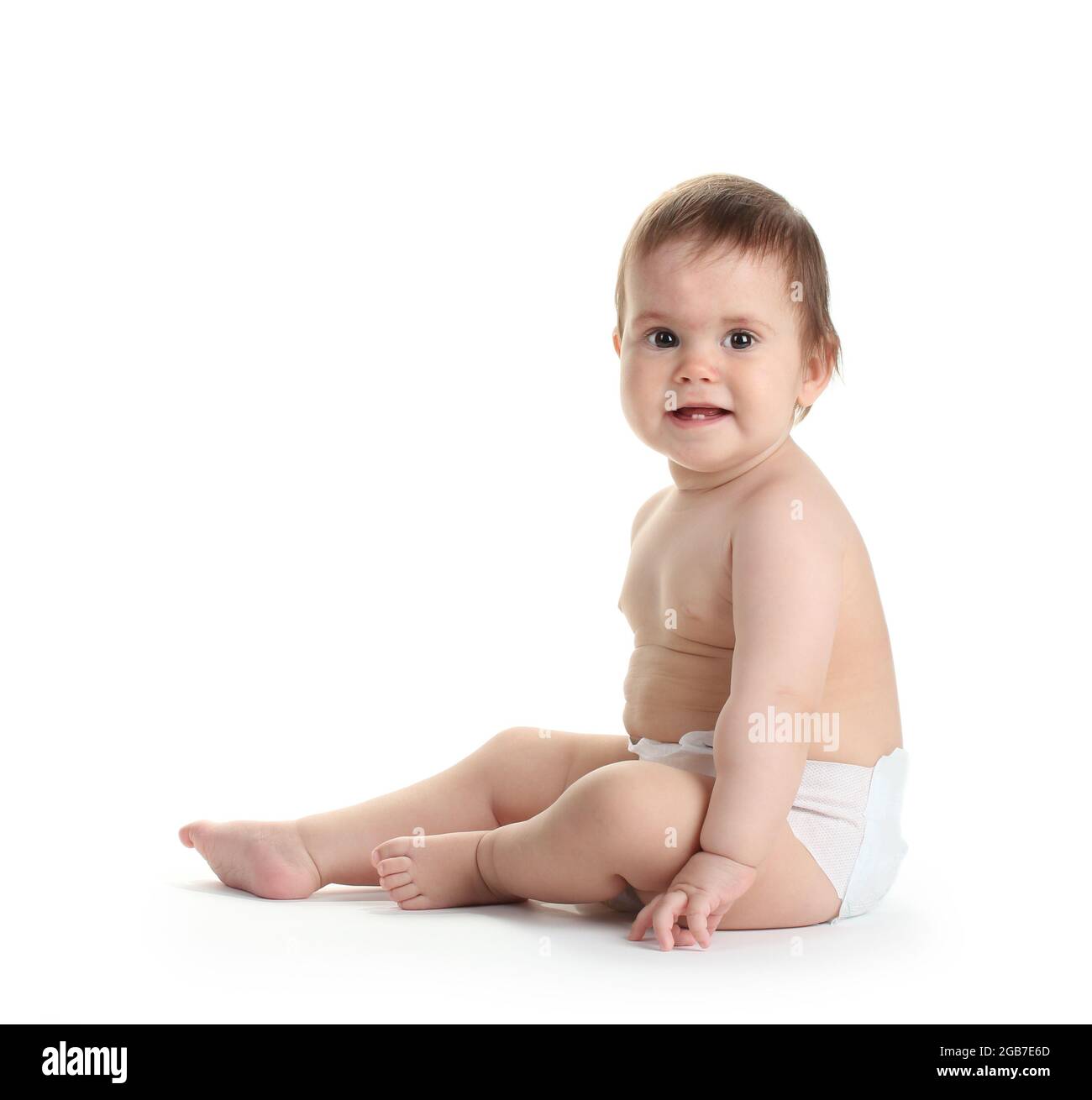 Cute baby girl sitting isolated on white Stock Photo - Alamy