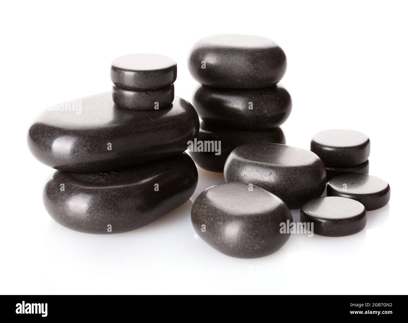 Spa stones isolated on white Stock Photo - Alamy