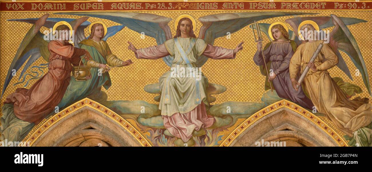 VIENNA, AUSTIRA - JUNI 24, 2021: The fresco of angels with the sactification symbols in the Votivkirche church by brothers Carl and Franz Jobst Stock Photo