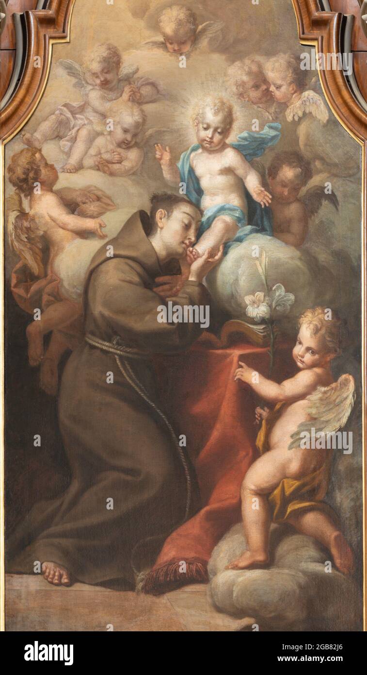 VIENNA, AUSTIRA - JULI 5, 2021: The detail of painting of St. Anthny vision of Madonna in the church Kapuzinerkirche by capuchin Norbert Baumgartner Stock Photo