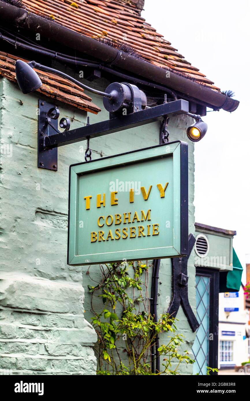 Sign on the exterior of The Ivy Cobham Brasserie, Cobham, Surrey, UK Stock Photo