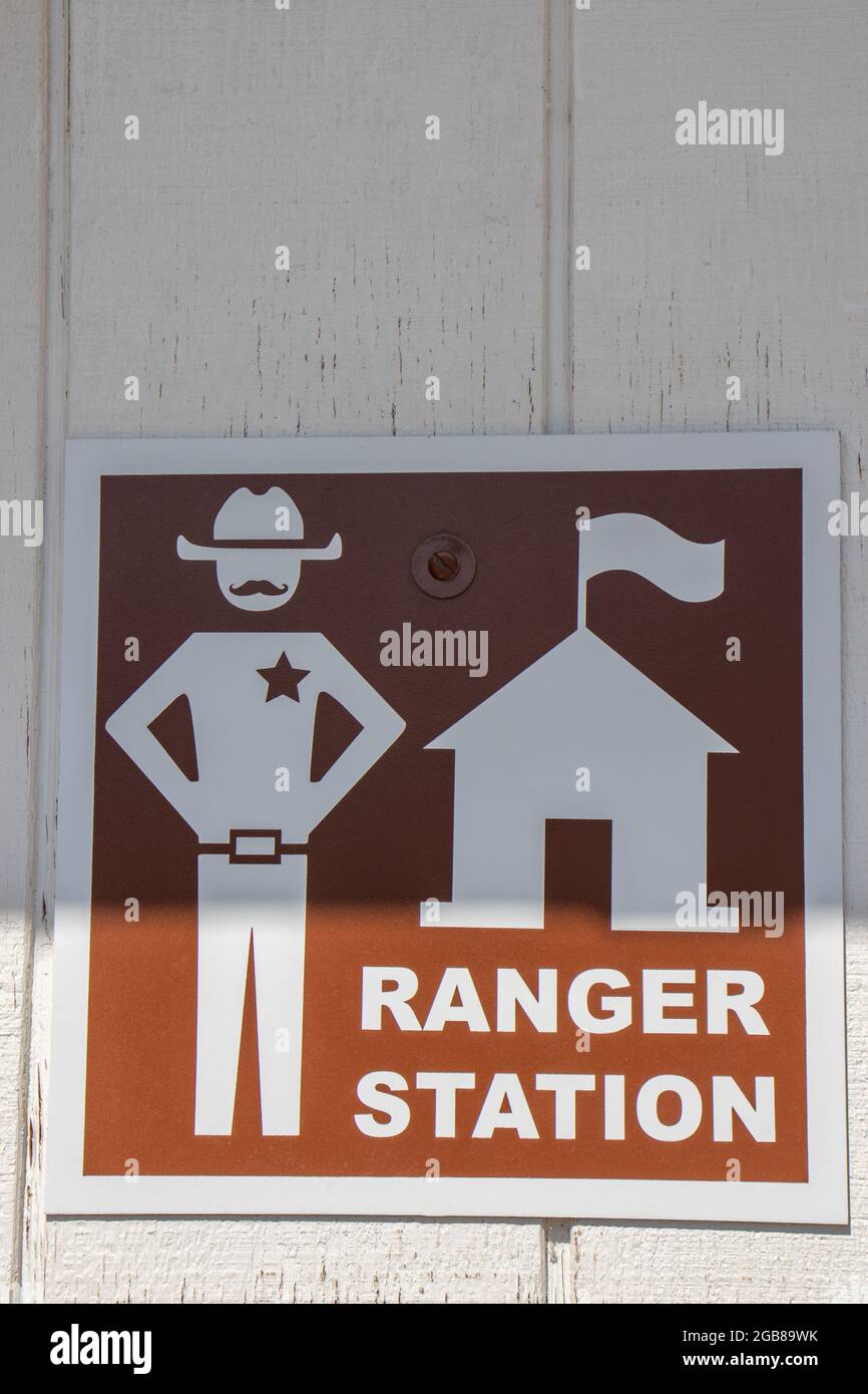 Park Ranger Station Sign on side of building Stock Photo
