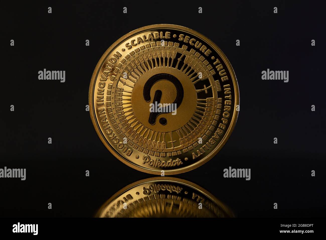 Polkadot DOT Cryptocurrency physical coin placed on reflective surface in  the dark background Stock Photo - Alamy