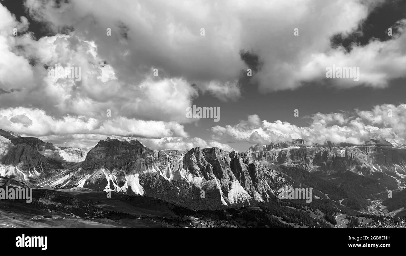 Mountain peaks under the sky with clouds Dolomites Italy Stock Photo ...