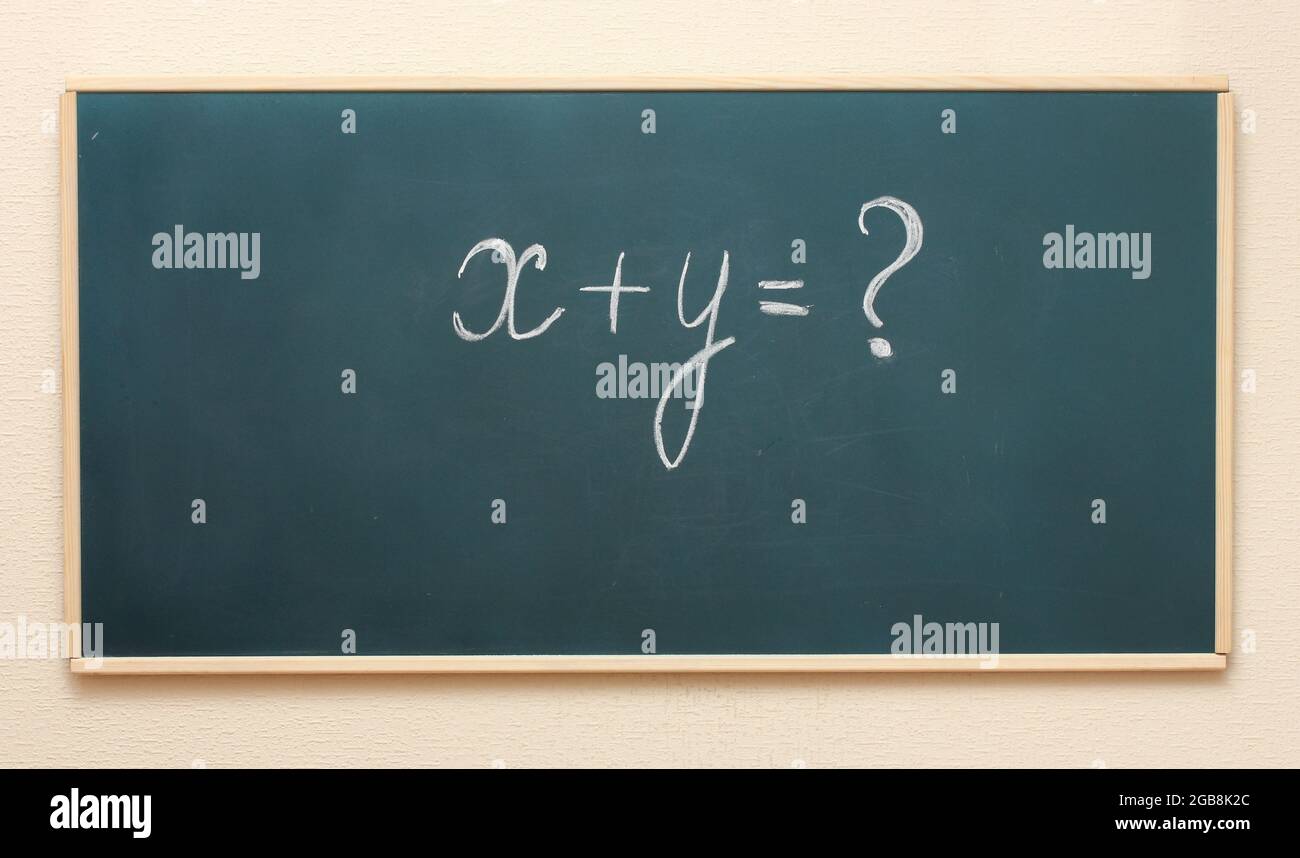 The example on the blackboard Stock Photo Alamy