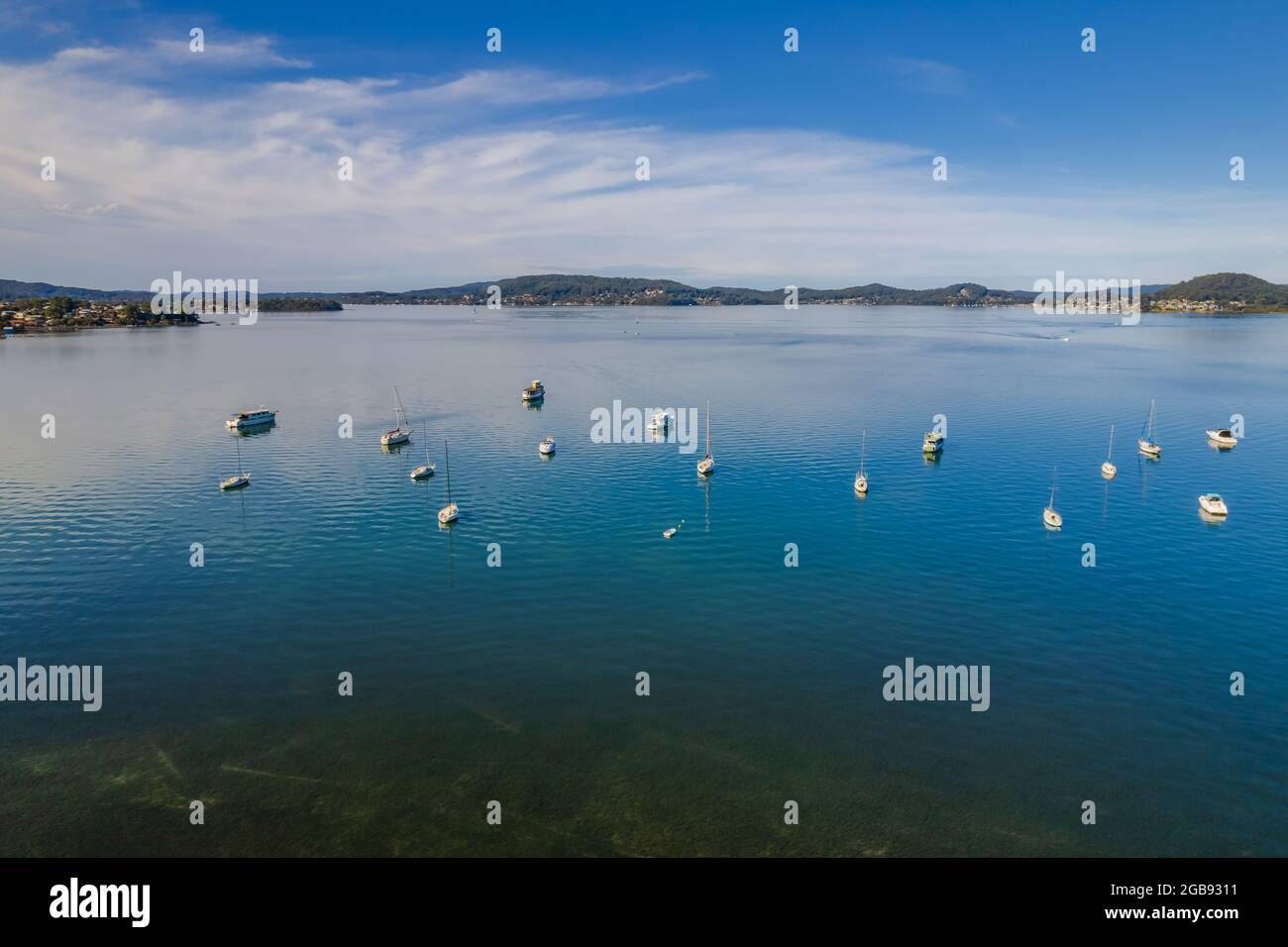 Blue sky and boats at Koolewong Waterfront on the Central Coast, NSW, Australia. Stock Photo