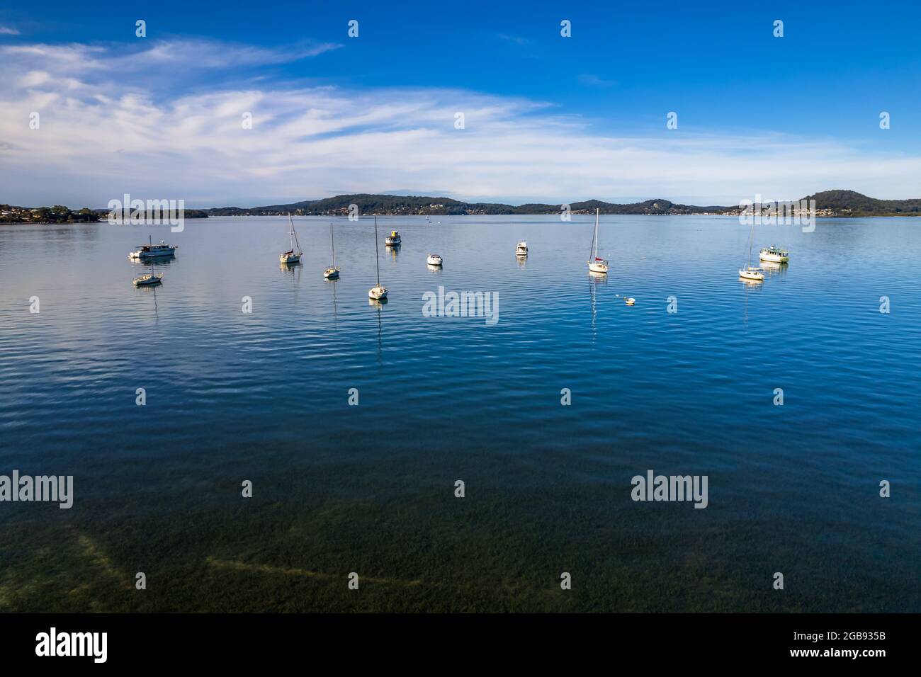 Blue sky and boats at Koolewong Waterfront on the Central Coast, NSW, Australia. Stock Photo