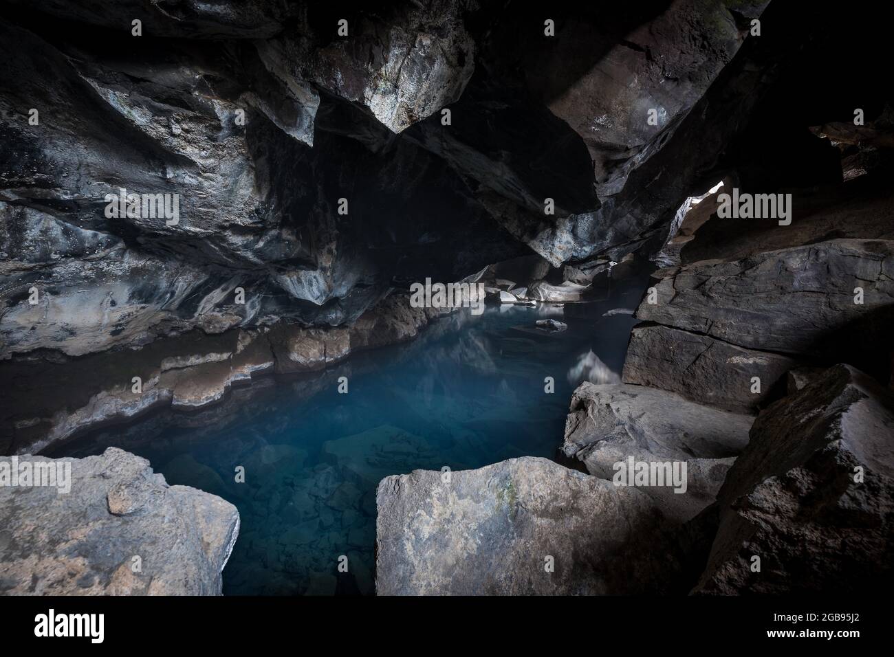 Lake, former bathing cave Grjotagja, known from Game of Thrones, near Reykjahlio, Myvatn or Myvatn, Krafla volcano system, Northern Iceland Stock Photo