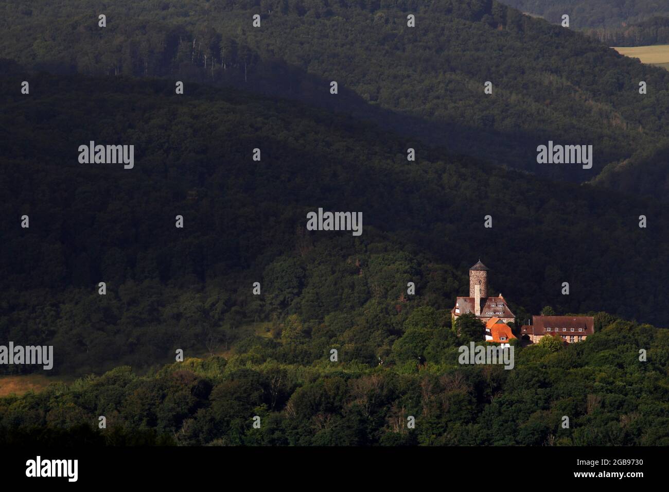 View from Bornhagen to Ludwigstein Castle in the Werra-Meissner district in Hesse, late medieval castle surrounded by forests of the Werra Mountains Stock Photo