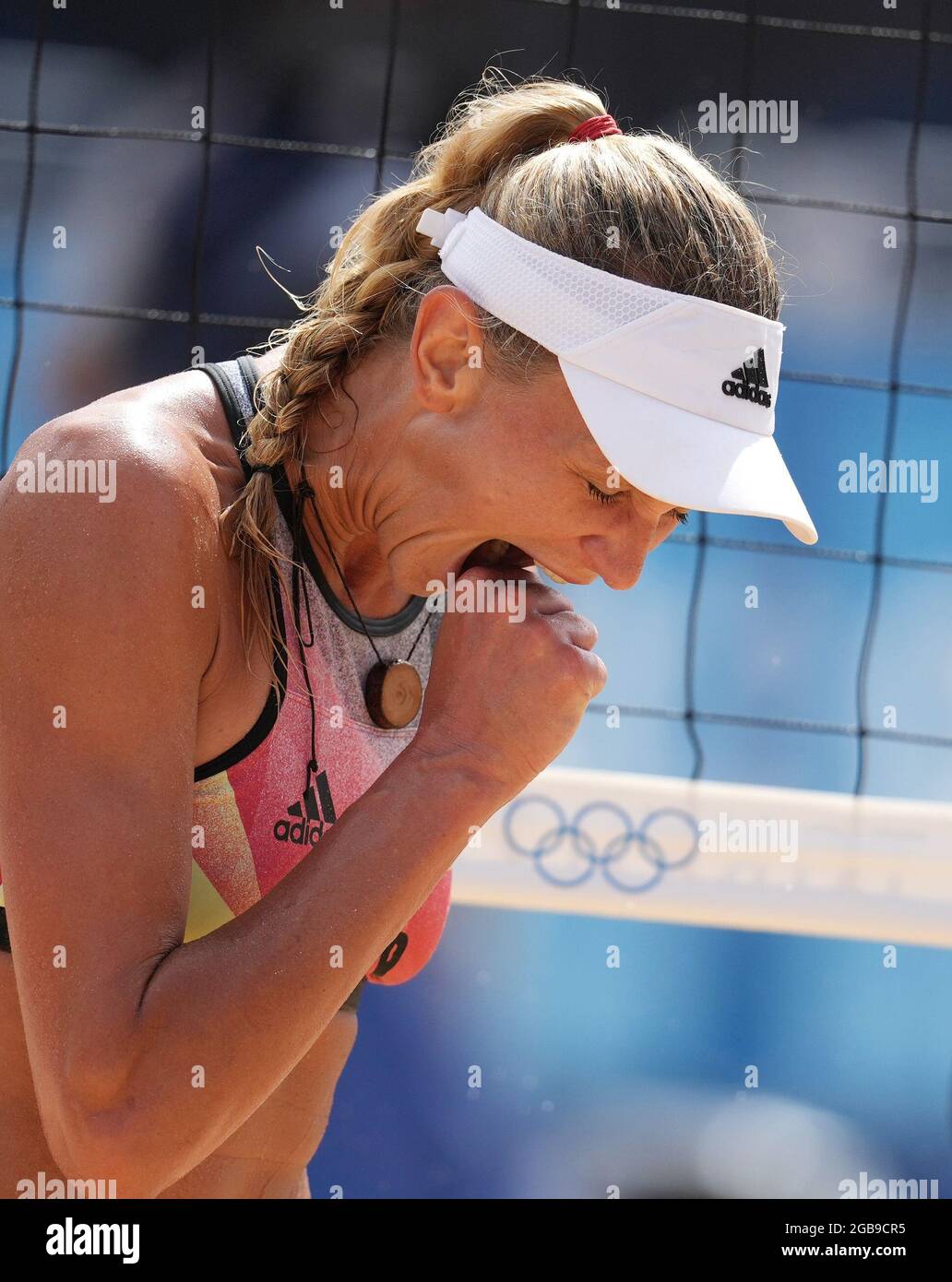 Tokyo, Japan. 3rd Aug, 2021. Germany's Margareta Kozuch reacts during the women's quarterfinal match of beach volleyball between Germany's Laura Ludwig/Margareta Kozuch and April Ross/Alix Klineman of the United States at the Tokyo 2020 Olympic Games in Tokyo, Japan, Aug. 3, 2021. Credit: Li He/Xinhua/Alamy Live News Stock Photo