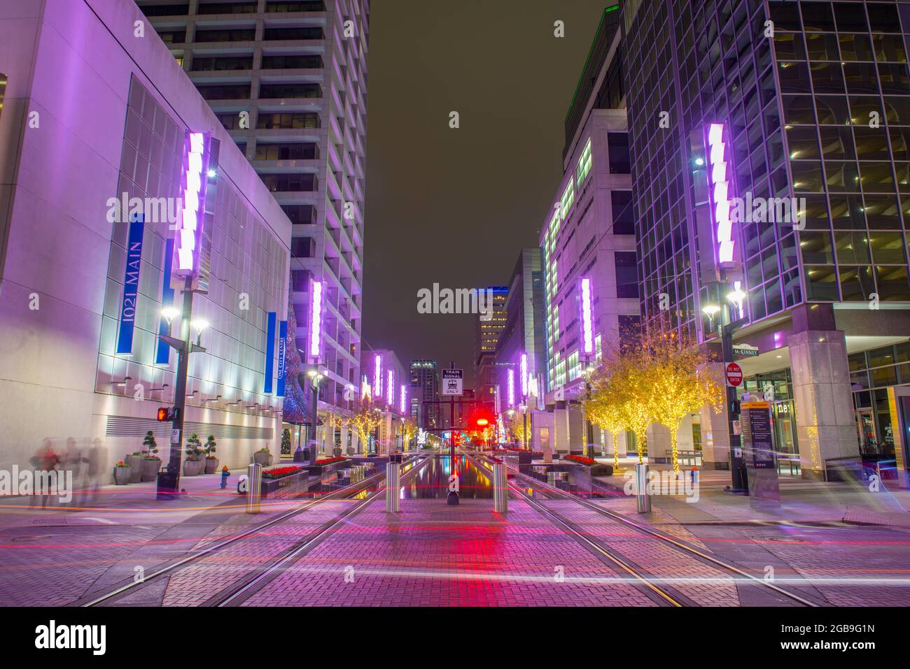 Houston downtown night scene on Main Street at McKinney Street with the