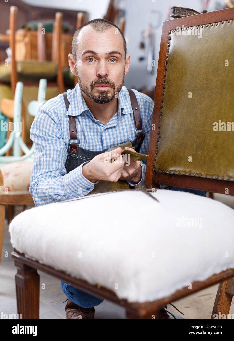 Craftsman using carpentry tools for restoration Stock Photo Alamy