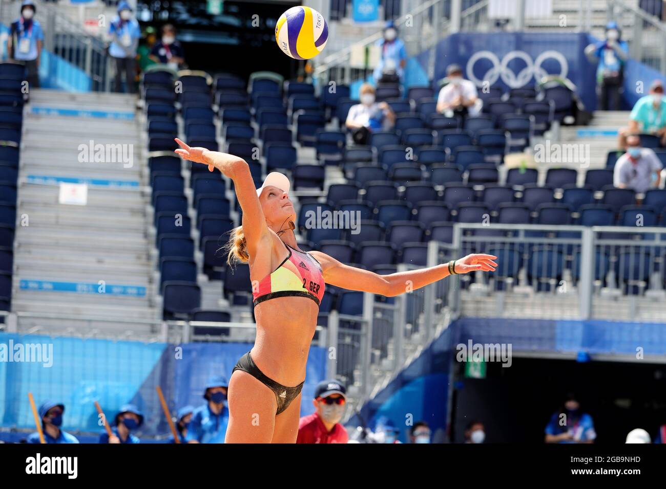 Tokyo, Japan, 3 August, 2021. Margareta Kozuch of Team Germany serves during the Women's Beach Volleyball Quarterfinal match between Germany and USA on Day 11 of the Tokyo 2020 Olympic Games. Credit: Pete Dovgan/Speed Media/Alamy Live News Stock Photo