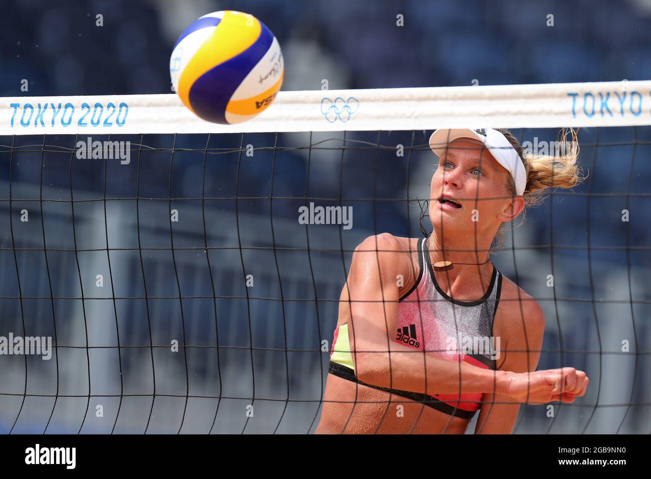 Tokyo, Japan, 3 August, 2021. Margareta Kozuch of Team Germany hits the ball over the net during the Women's Beach Volleyball Quarterfinal match between Germany and USA on Day 11 of the Tokyo 2020 Olympic Games. Credit: Pete Dovgan/Speed Media/Alamy Live News Stock Photo