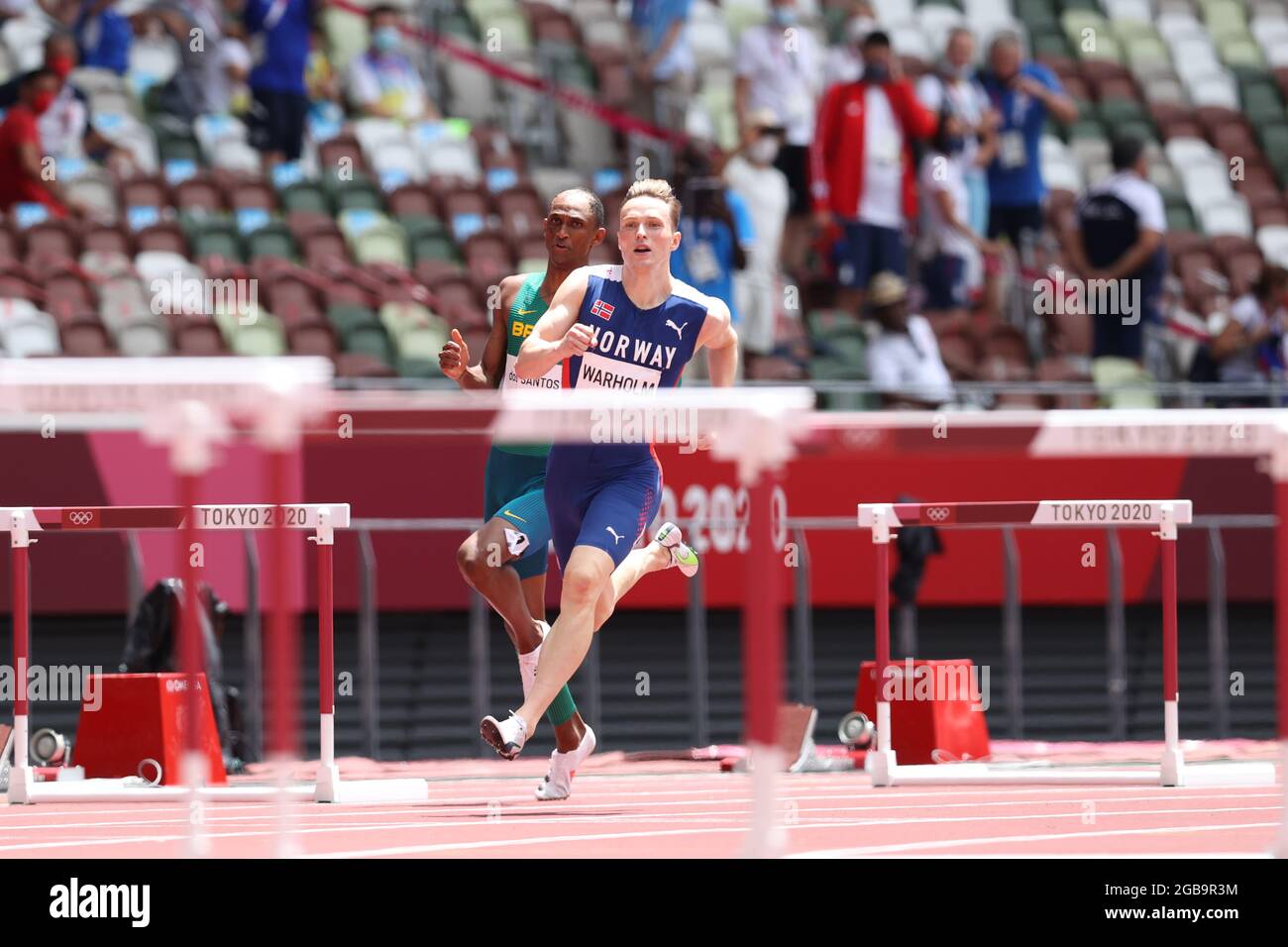 Karsten WARHOLM (NOR) wins the Men's 400m Hurdles Final in a new World