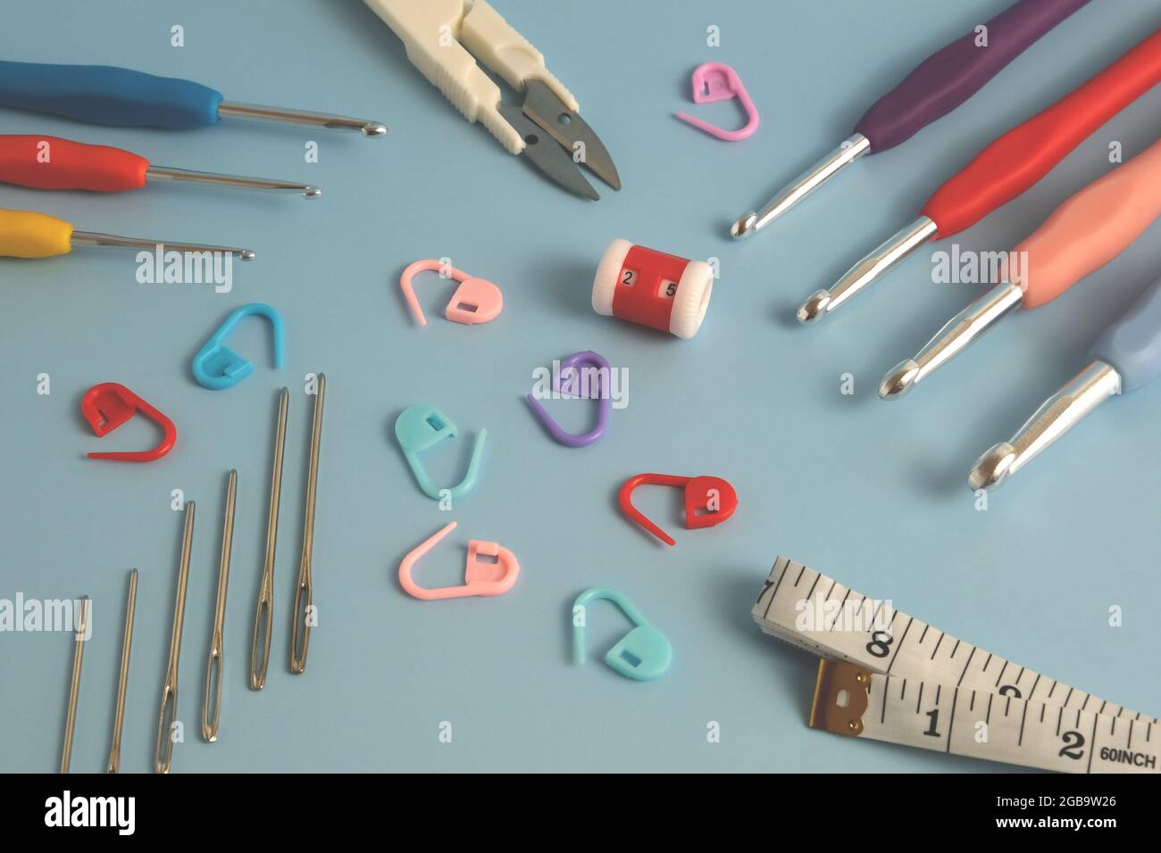 knitting kit on a blue background Stock Photo