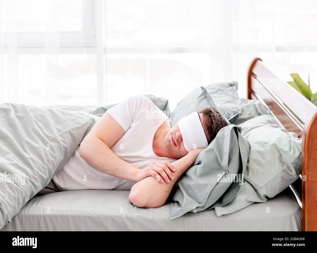 Man sleeping in the bed Stock Photo Alamy