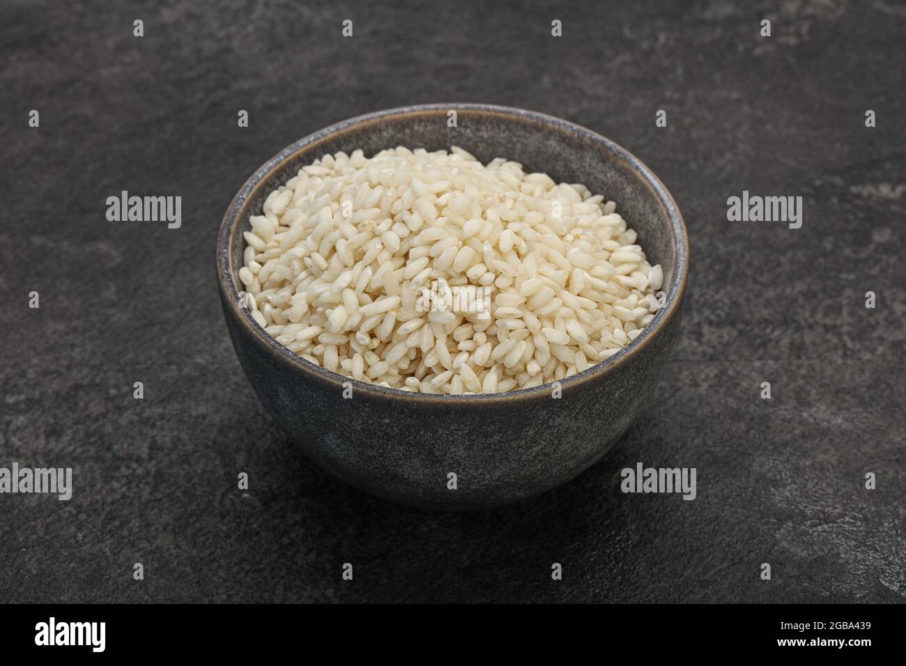 Raw Italian arborio rice for Risotto Stock Photo Alamy