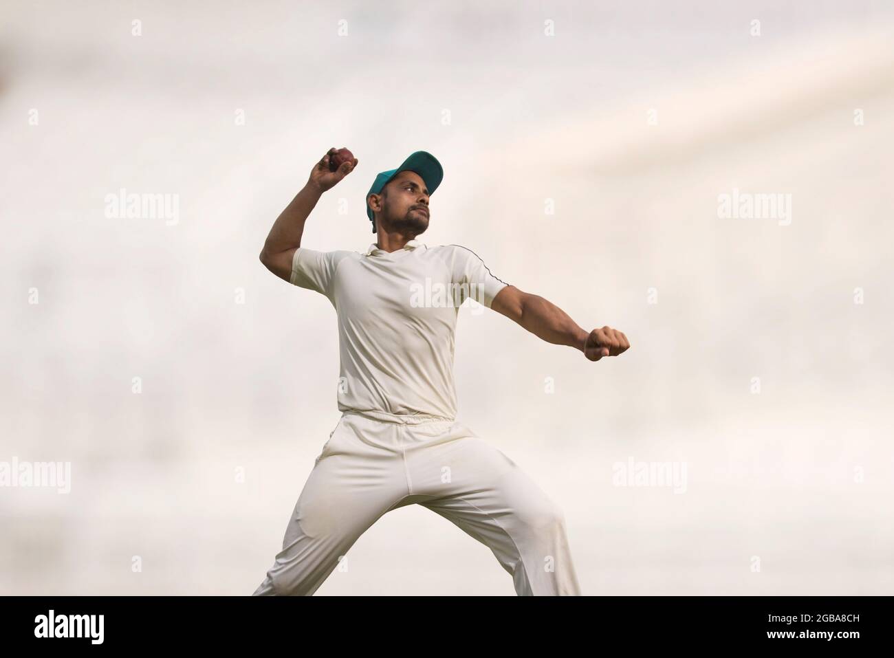 Man throwing the cricket ball hi-res stock photography and images - Alamy