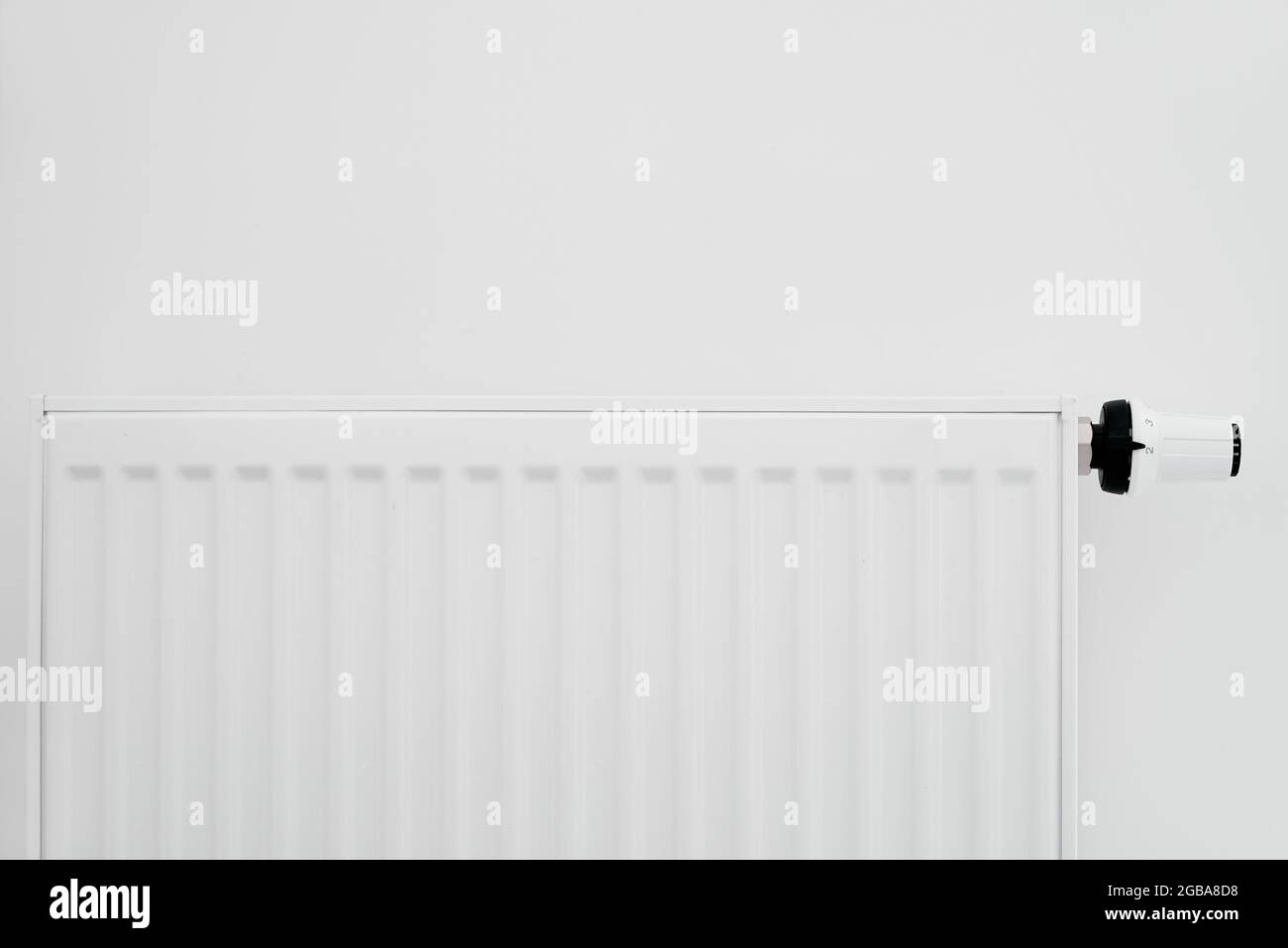 Heat radiator knob. Adjusting temperature on heating radiator Stock Photo Alamy