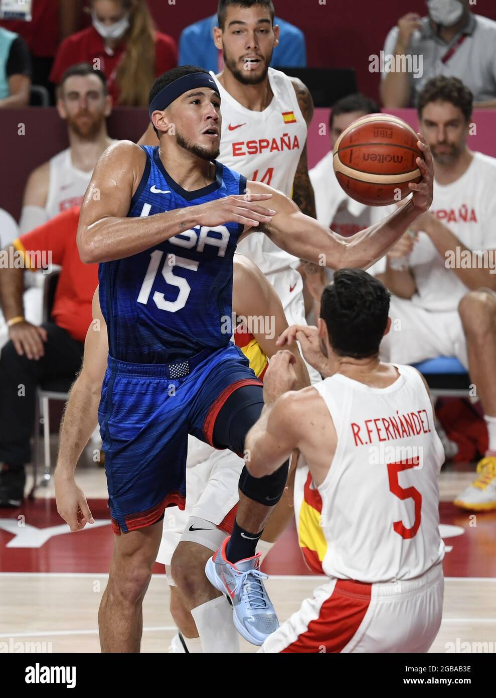 Tokyo, Japan. 03rd Aug, 2021. United States' Devin Booker (R) goes up to the basket over Spain's Rudt Fernandez during Men's Basketball quarterfinal game at the Tokyo 2020 Olympics, Tuesday, August 3, 2021, in Tokyo, Japan. USA won 95-81 to advance to the semi-final round. Photo by Mike Theiler/UP Credit: UPI/Alamy Live News Stock Photo