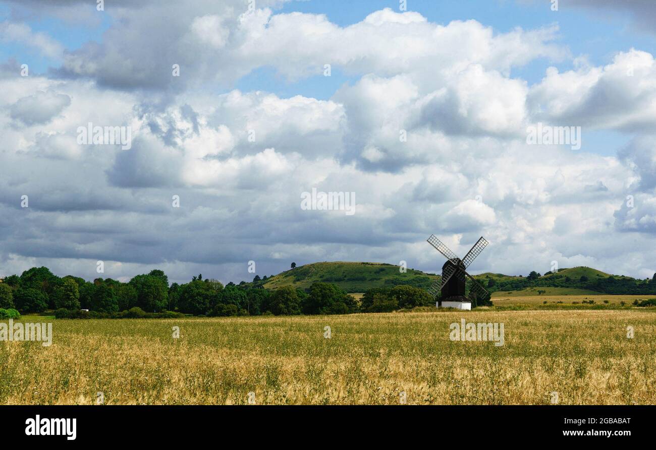 Pitstone Mill dates back to the 17th century, when it was once a working mill. Pictured surrounded by the Chiltern Hills (Area of Natural Beauty). Stock Photo