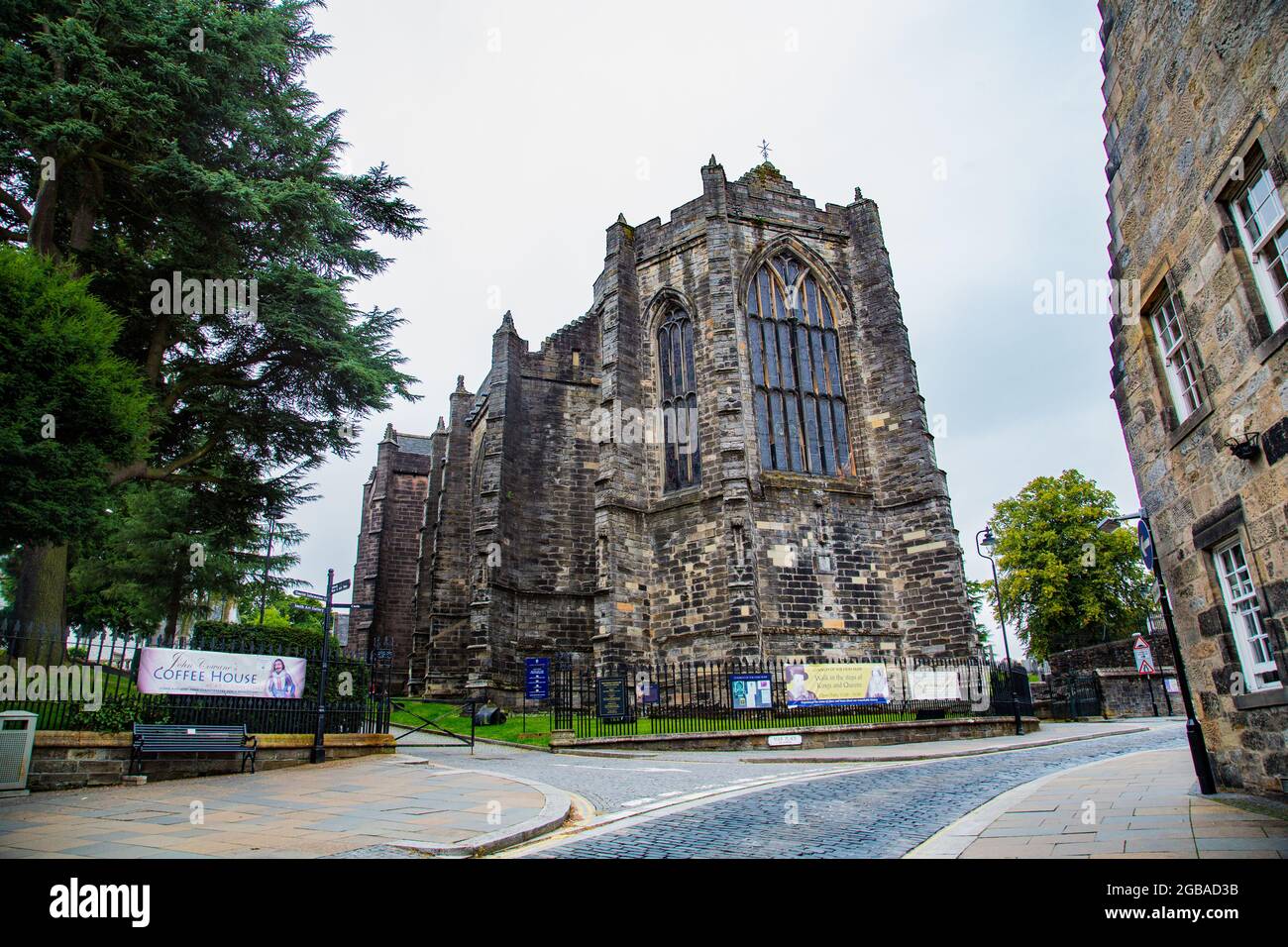 Gothic court church with stained glass windows in pointed arches Stock