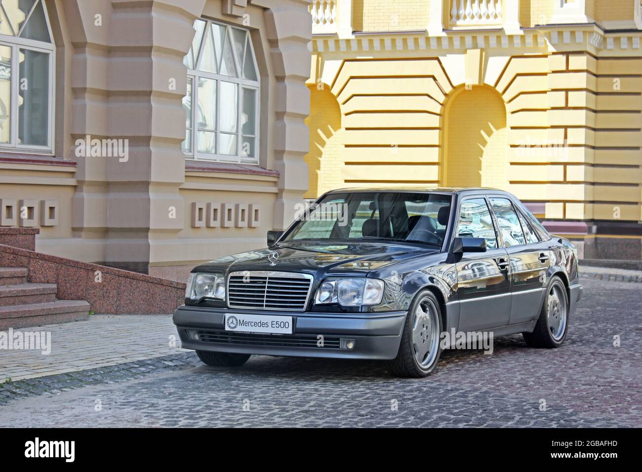 Kiev, Ukraine - 25 August 2014: Gray Mercedes E500 W124 Wolf in the city Stock Photo