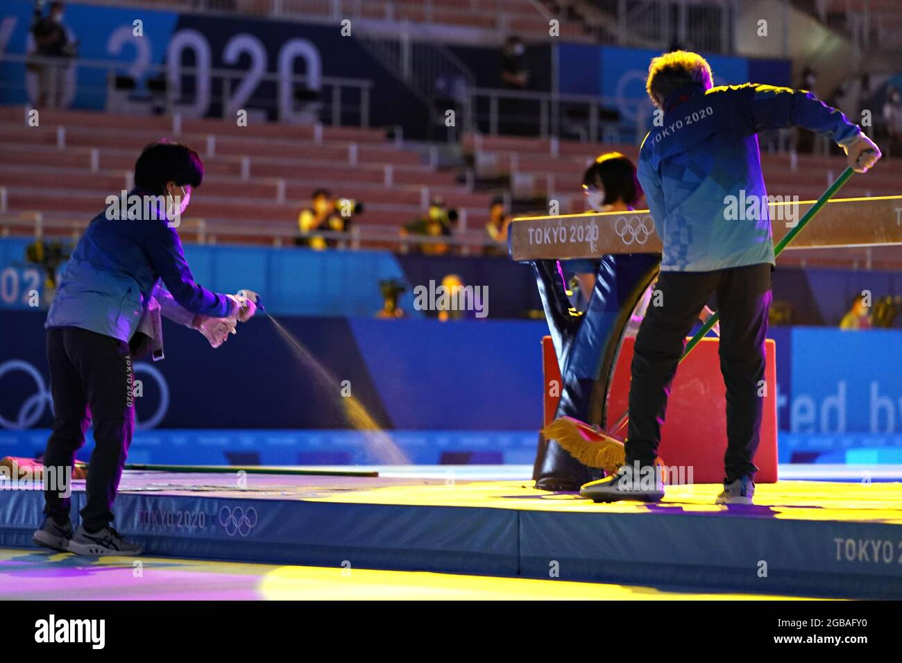 Tokyo, Japan. 03rd Aug, 2021. Workers sanitize the balance beam before the start of the women's individual apparatus artistic gymnastics final at the Ariake Gymnastics Centre at the Tokyo Olympic Games in Tokyo, Japan, on Tuesday, August 3, 2021. Photo by Richard Ellis/UPI Credit: UPI/Alamy Live News Stock Photo