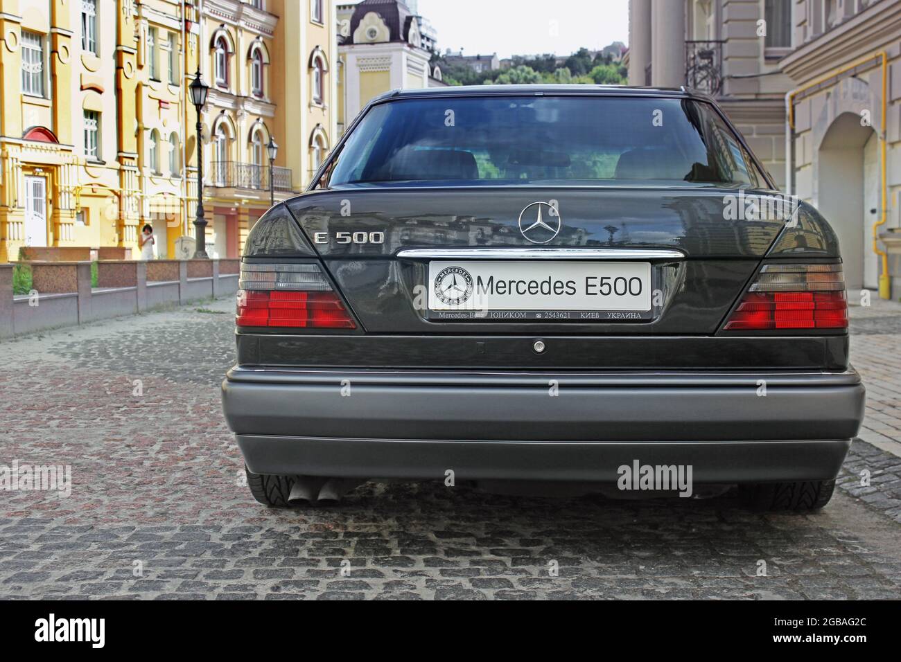 Kiev, Ukraine - 25 August 2014: Gray Mercedes E500 W124 Wolf in the city Stock Photo