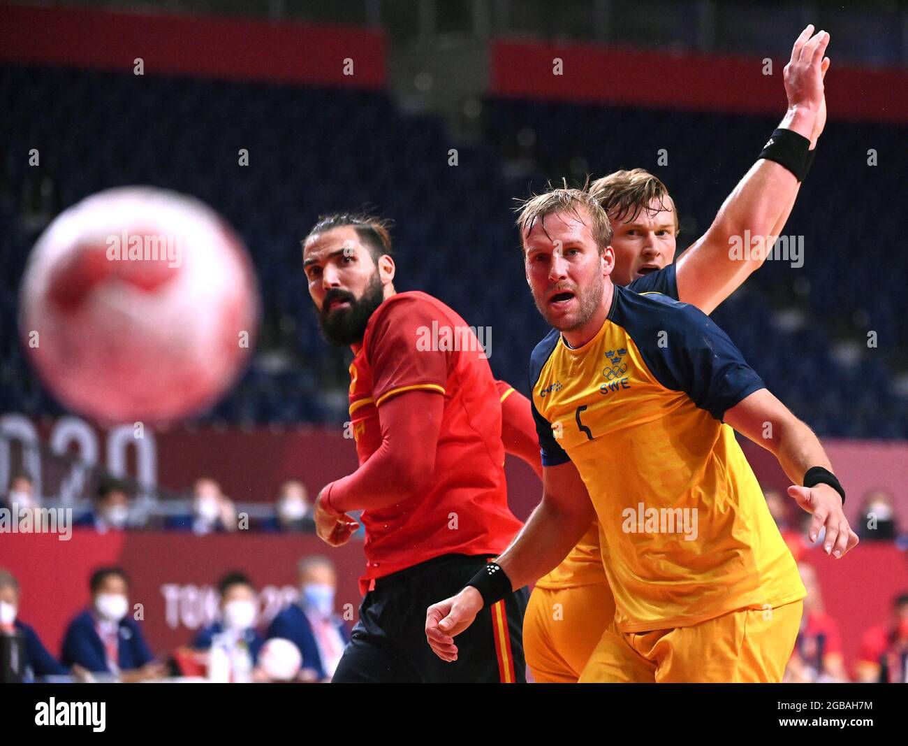 Tokyo, Japan. 3rd Aug, 2021. Jorge Maqueda Peno (L) of Spain, Max Darj (C) and Jonathan Carlsbogard of Sweden react during the handball men's quarterfinal between Sweden and Spain at the Tokyo 2020 Olympic Games in Tokyo, Japan, Aug. 3, 2021. Credit: Guo Chen/Xinhua/Alamy Live News Stock Photo