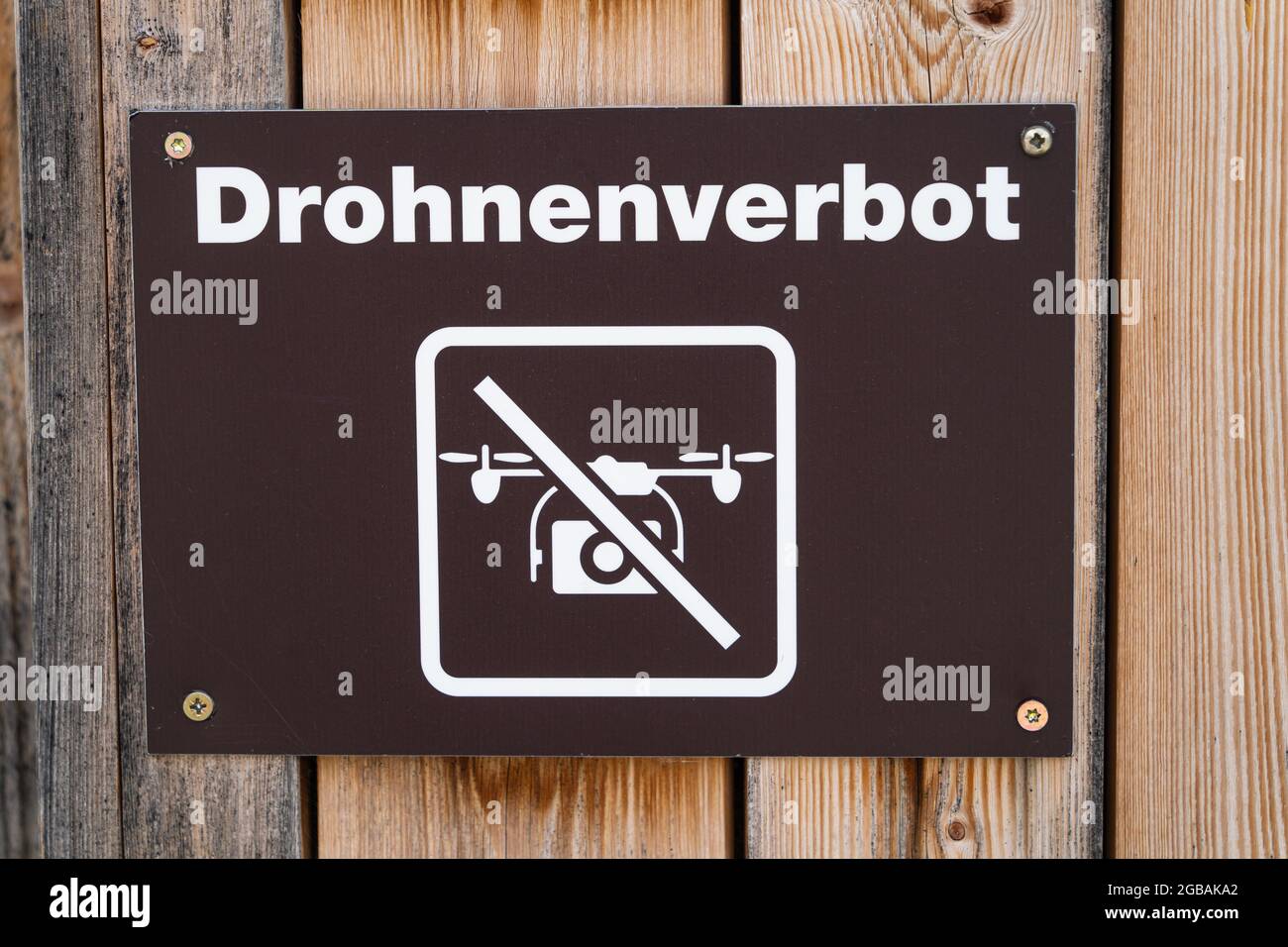 Warning sign prohibiting drones from flying in the swiss tourist area. Translation of the german sign: Ban on drones Stock Photo