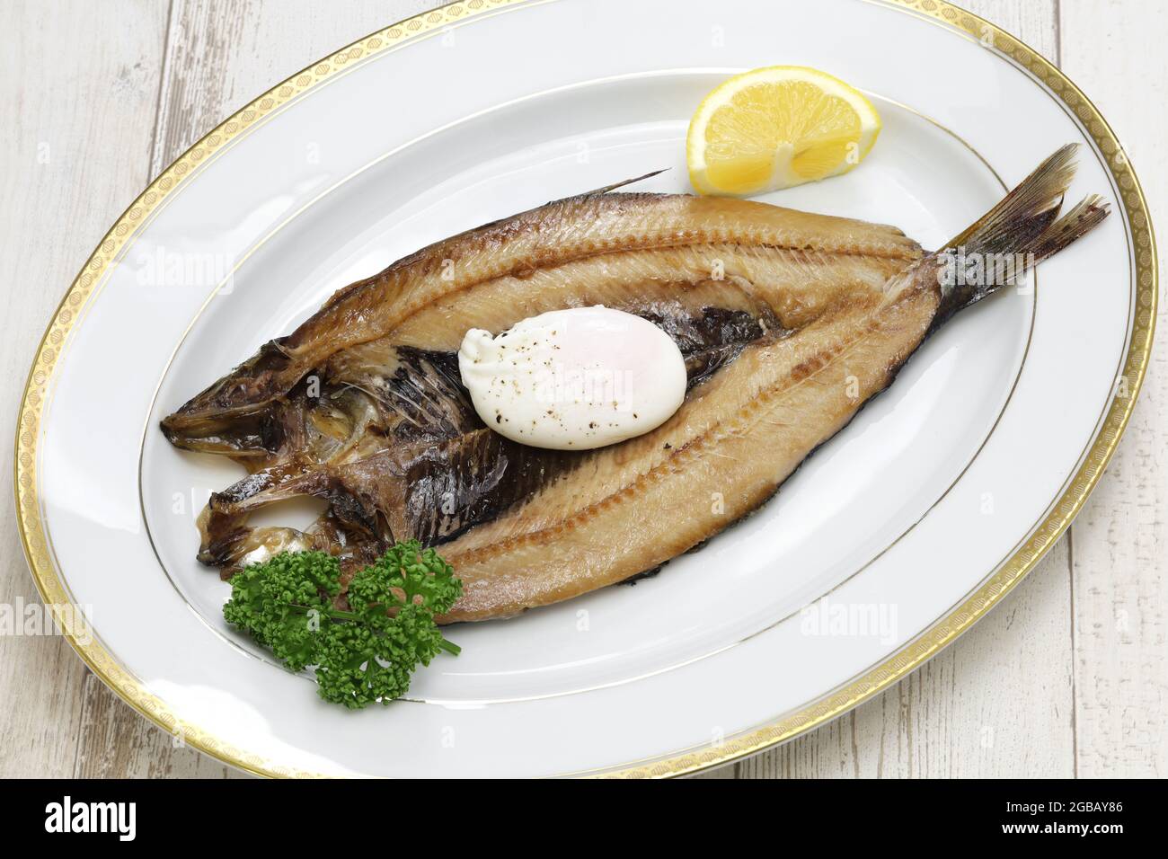 kipper(smoked herring) and poached egg, traditional British breakfast