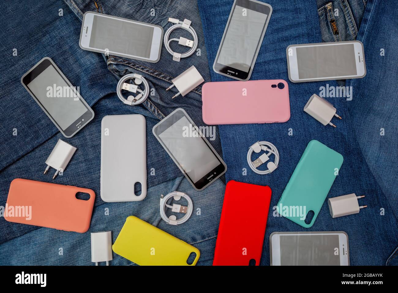 texture of mobile phone accessories on a denim background Stock Photo