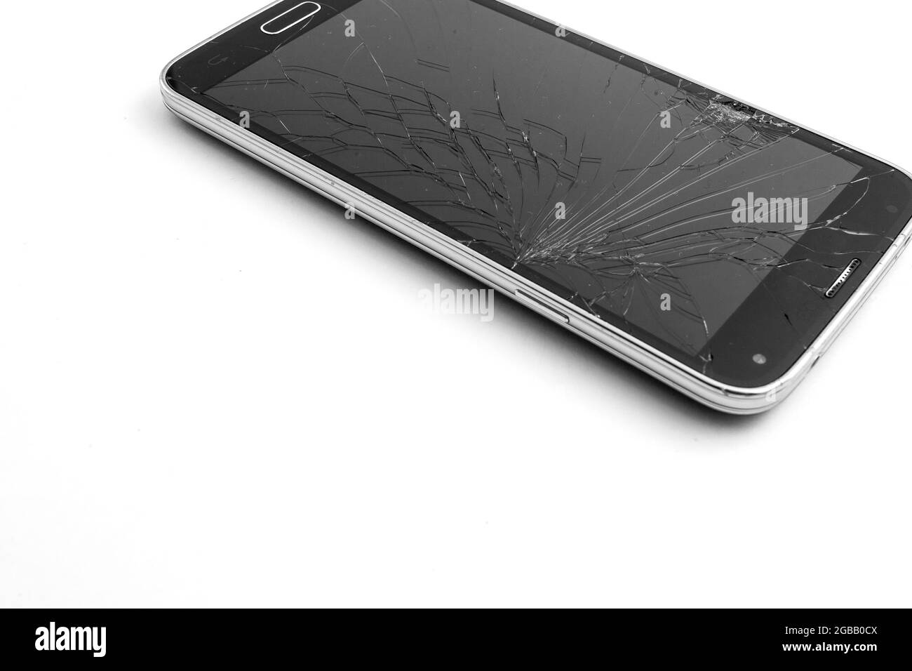 broken mobile phone display on a white background Stock Photo