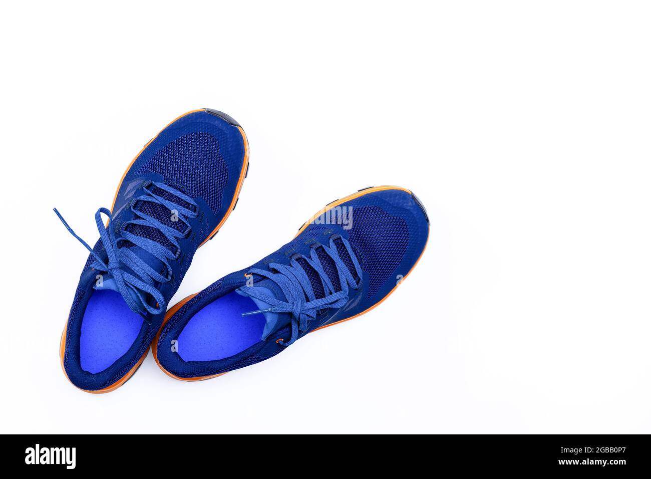 blue sneakers on a white isolated background Stock Photo