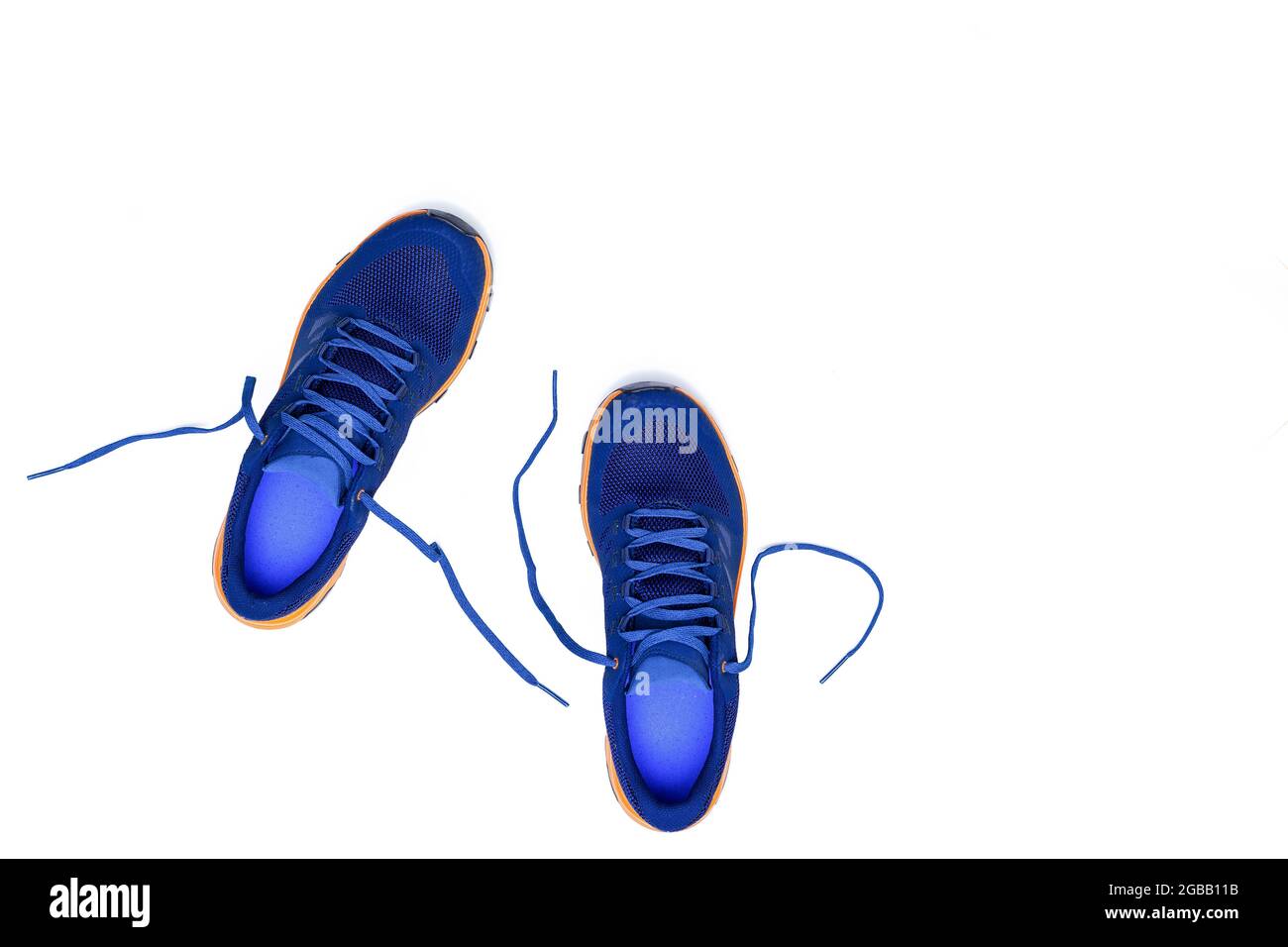 blue sneakers on a white isolated background Stock Photo